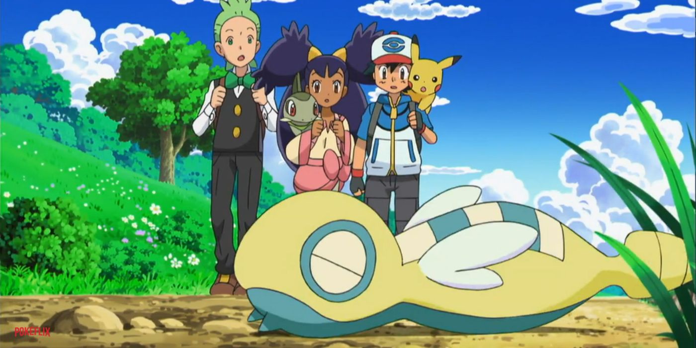 Ash y sus amigos miran a Dunsparce.