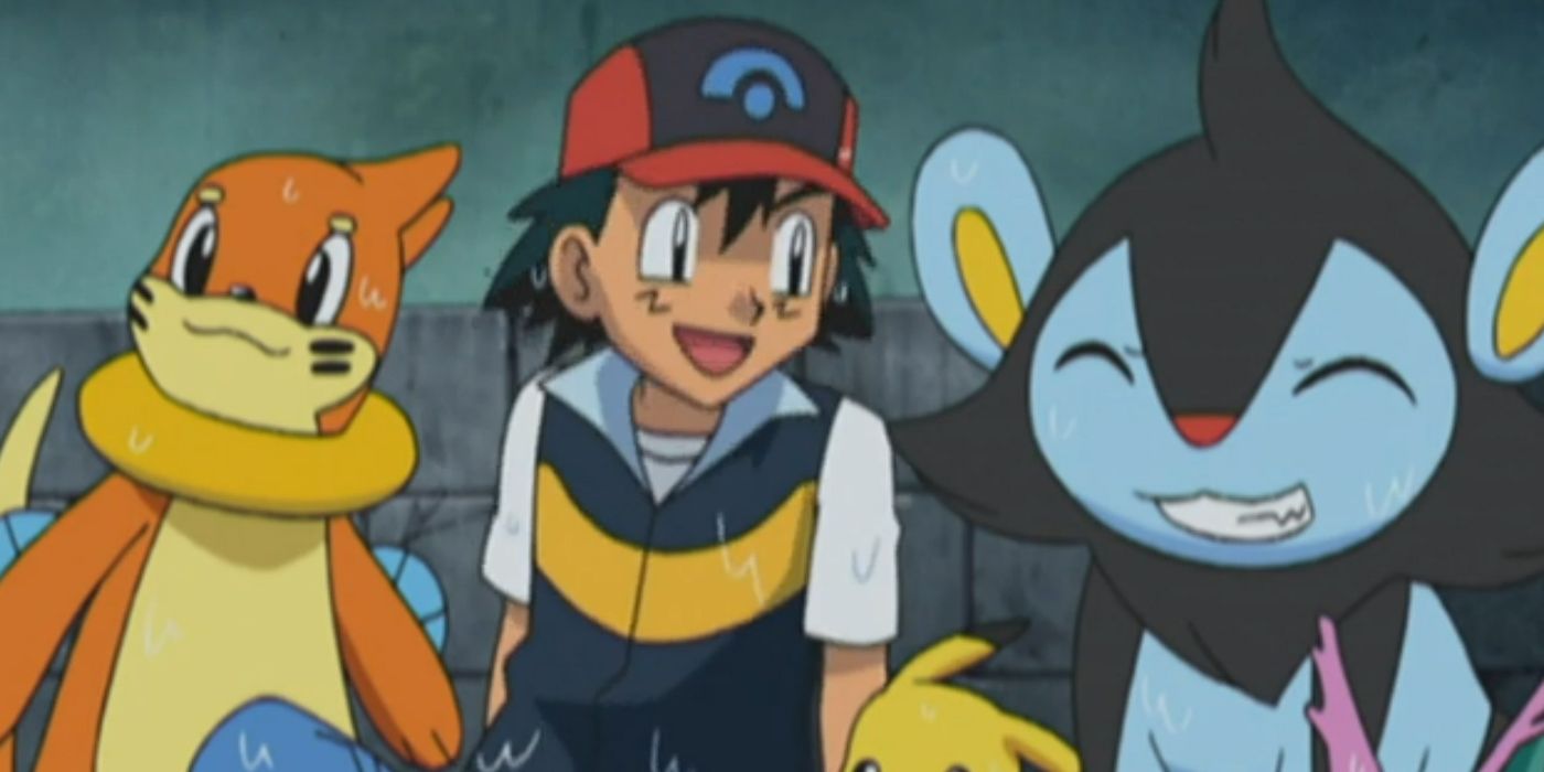 Ash y Luxio sonríen después de ayudar a Wailmer.