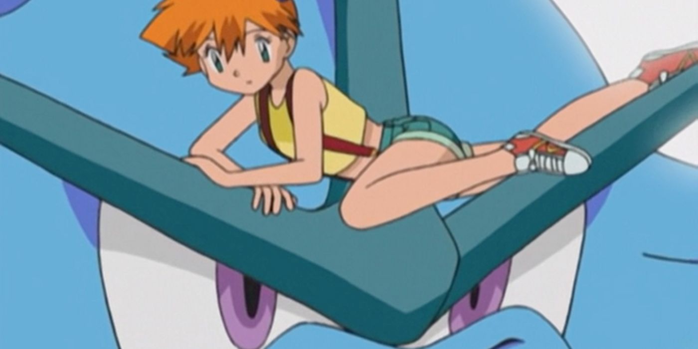 Misty poses on Gyarados' head.