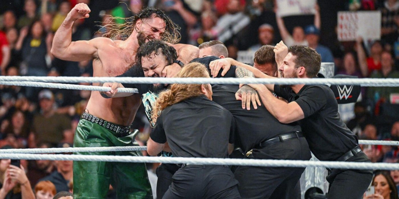 security tries to separate a brawl between Bronson Reed and Seth Rollins on WWE Monday Night Raw