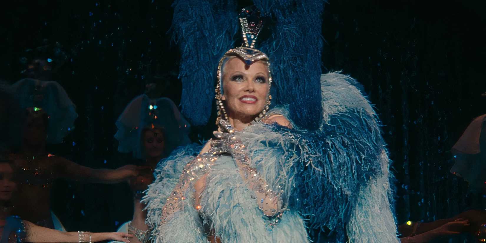 Pamela Anderson in blue sequins and feathers for The Last Showgirl