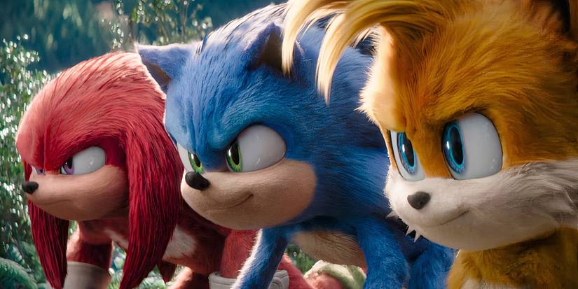 Sonic, Tails, and Knuckles standing next to each other in Sonic the Hedgehog 2