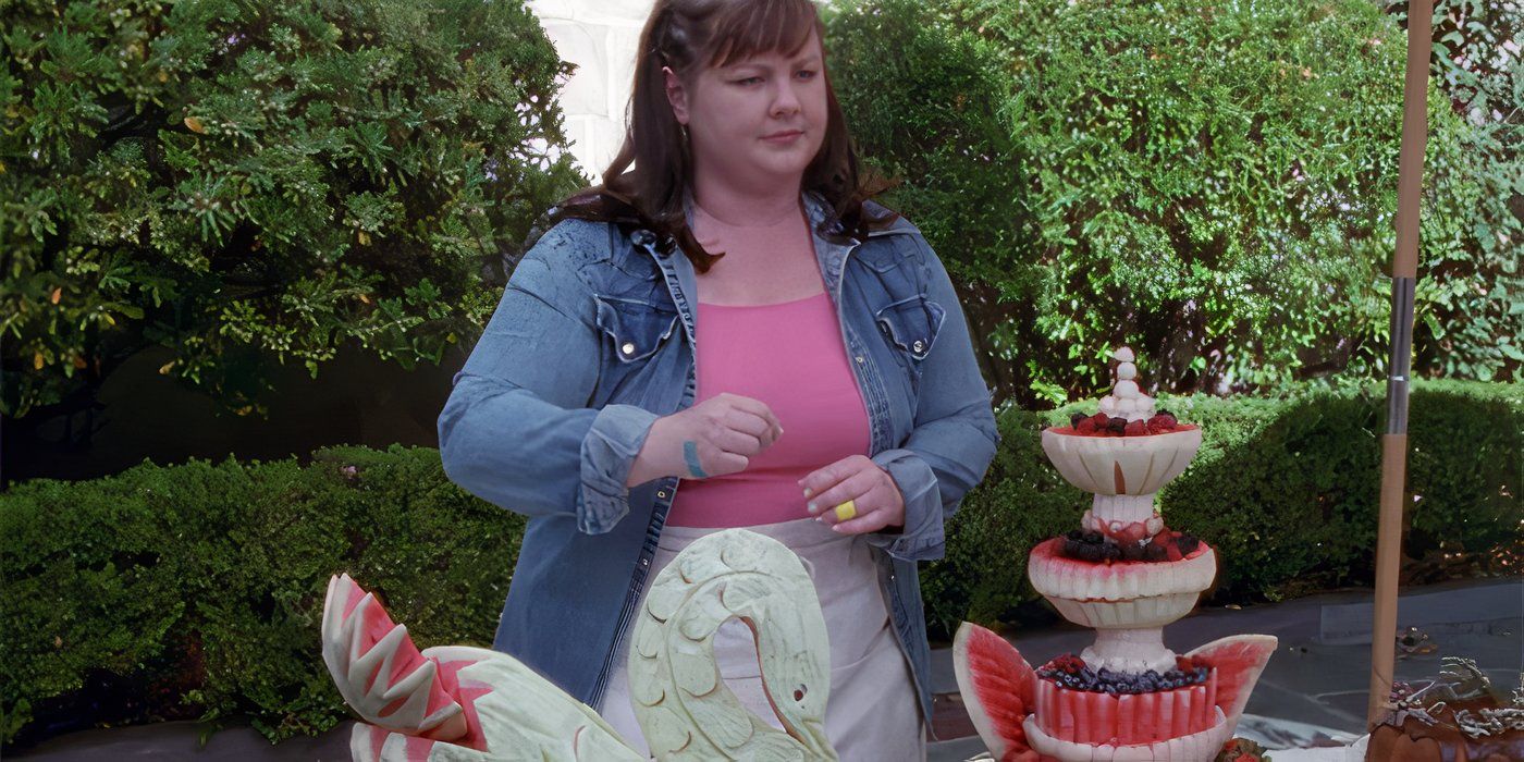 Sookie em uma venda de bolos em Gilmore Girls