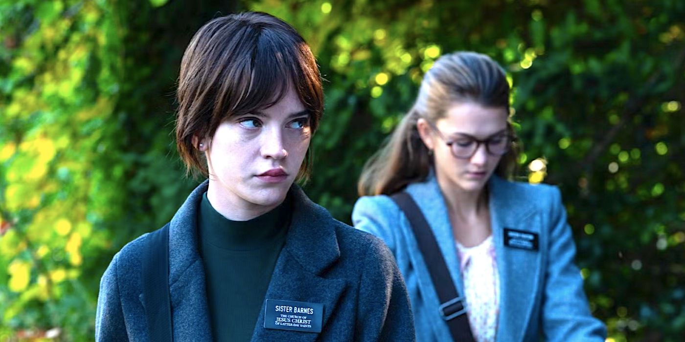 Sophie Thatcher's Sister Barnes and Chloe East's Sister Paxton stand outside in the sun from Heretic