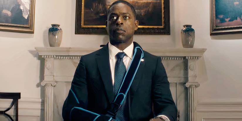 Sterling K Brown sitting in the Oval Office with his arm in a sling in Paradise