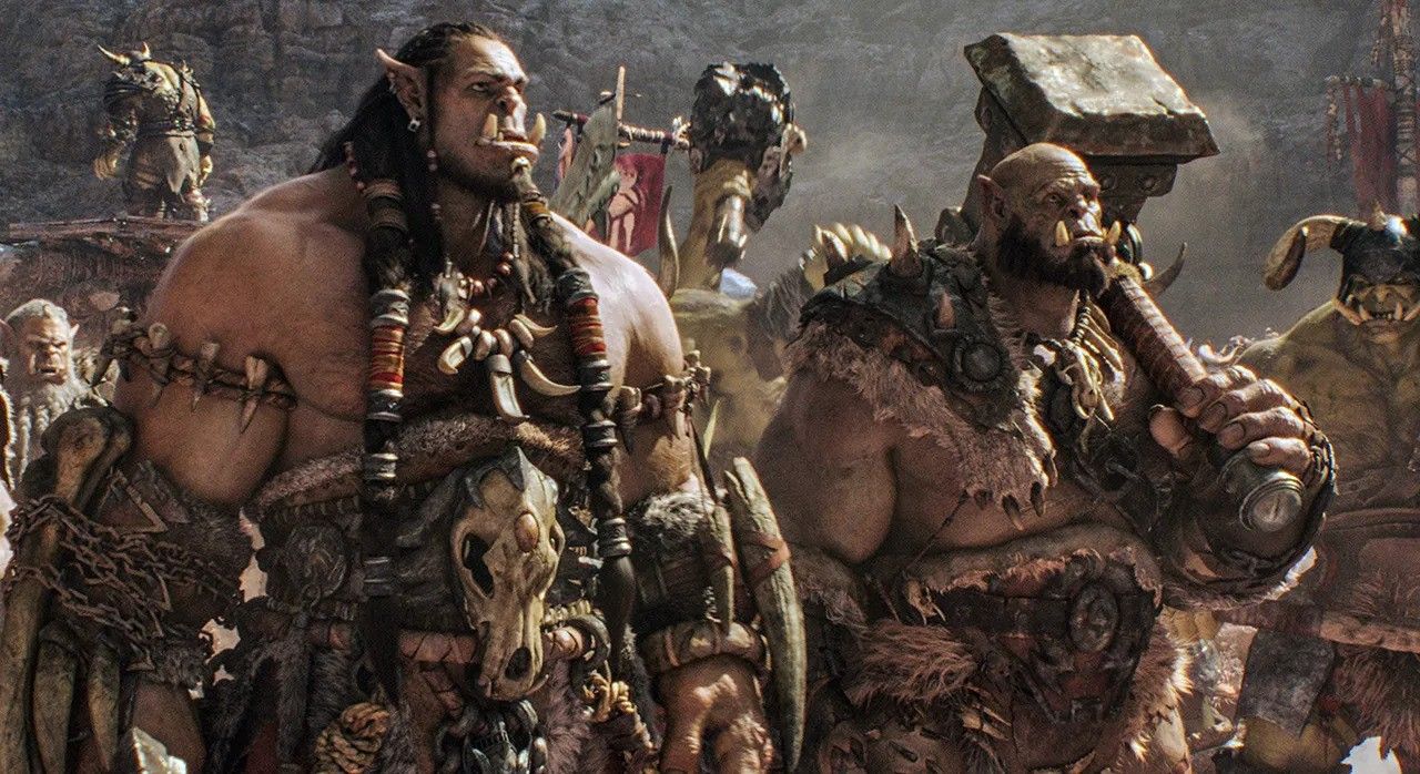 Still from the Warcraft movie of two large orcs