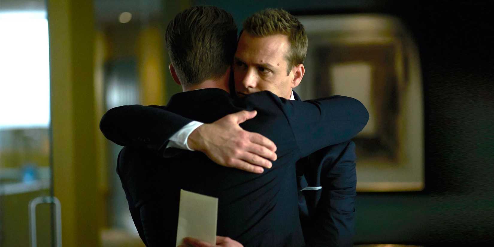 Mike and Harvey hugging in Suits