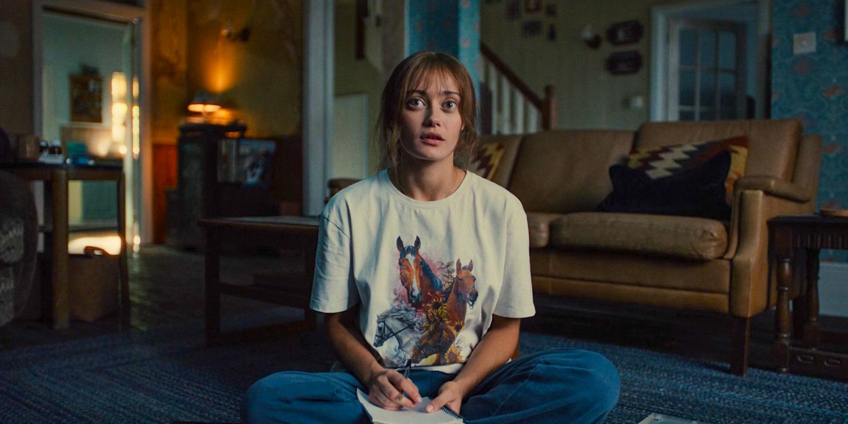 Rhiannon (Ella Purnell) taking notes from serial killer movies in Sweetpea Season 1 Ep 3