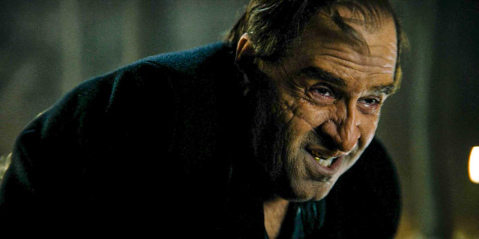 Oz/The Penguin (Colin Farrell) with tears in his eyes after strangling Victor in The Penguin Season 1 Ep 8
