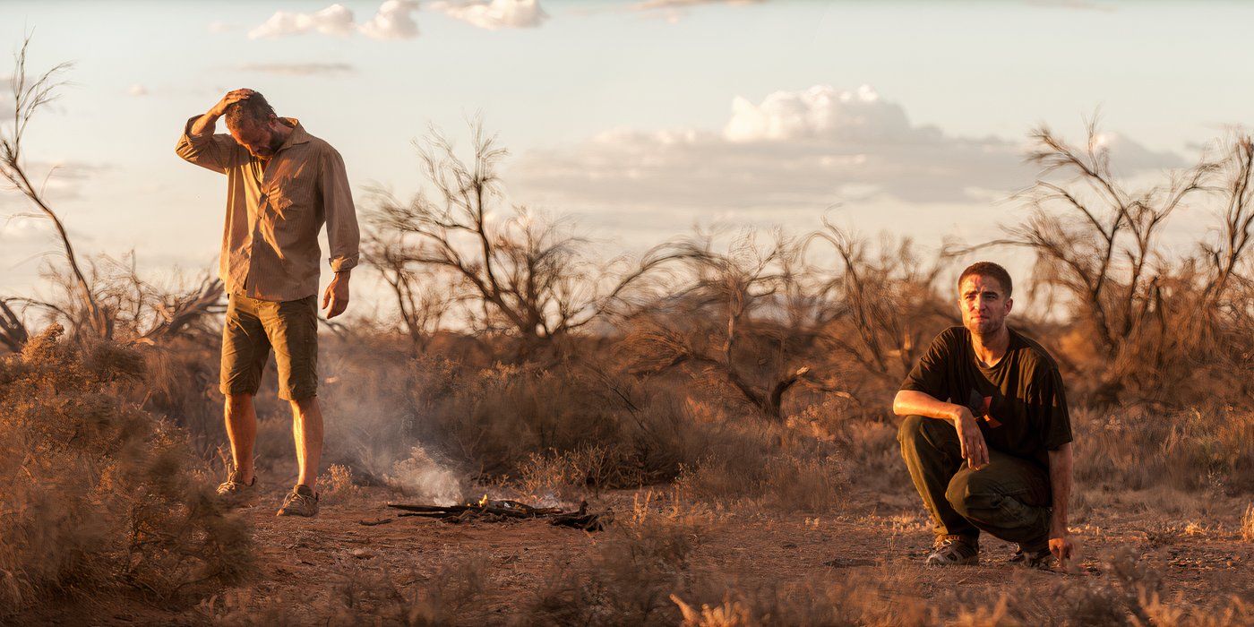 The Rover 2014 - Guy Pearce And Robert Pattinson looking dejected in the Australian Outback