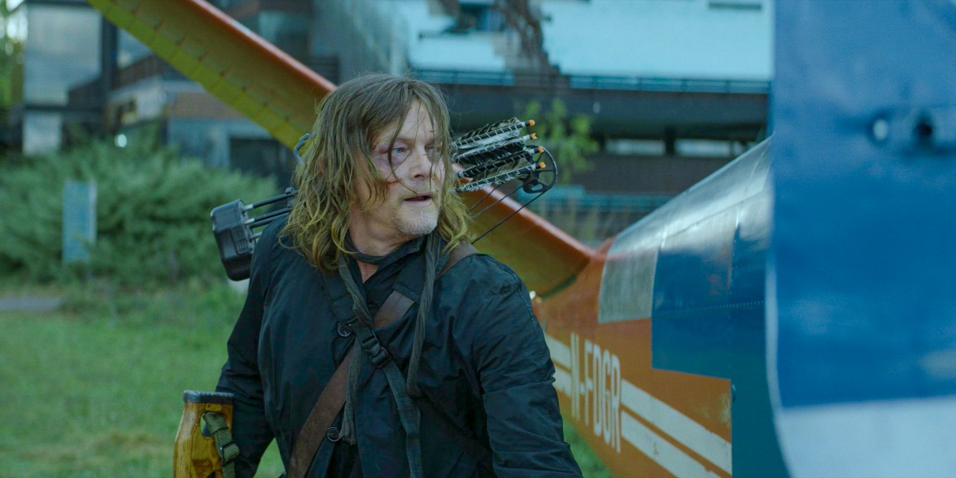 Daryl (Norman Reedus) standing by a plane in The Walking Dead: Daryl Dixon Season 2 Ep 6