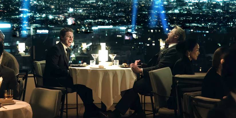 Two lawyers laughing at a rooftop dinner in the Suits LA teaser