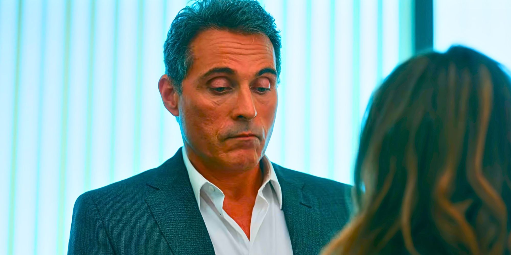 Rufus Sewell looking down as Hal Wyler in The Diplomat