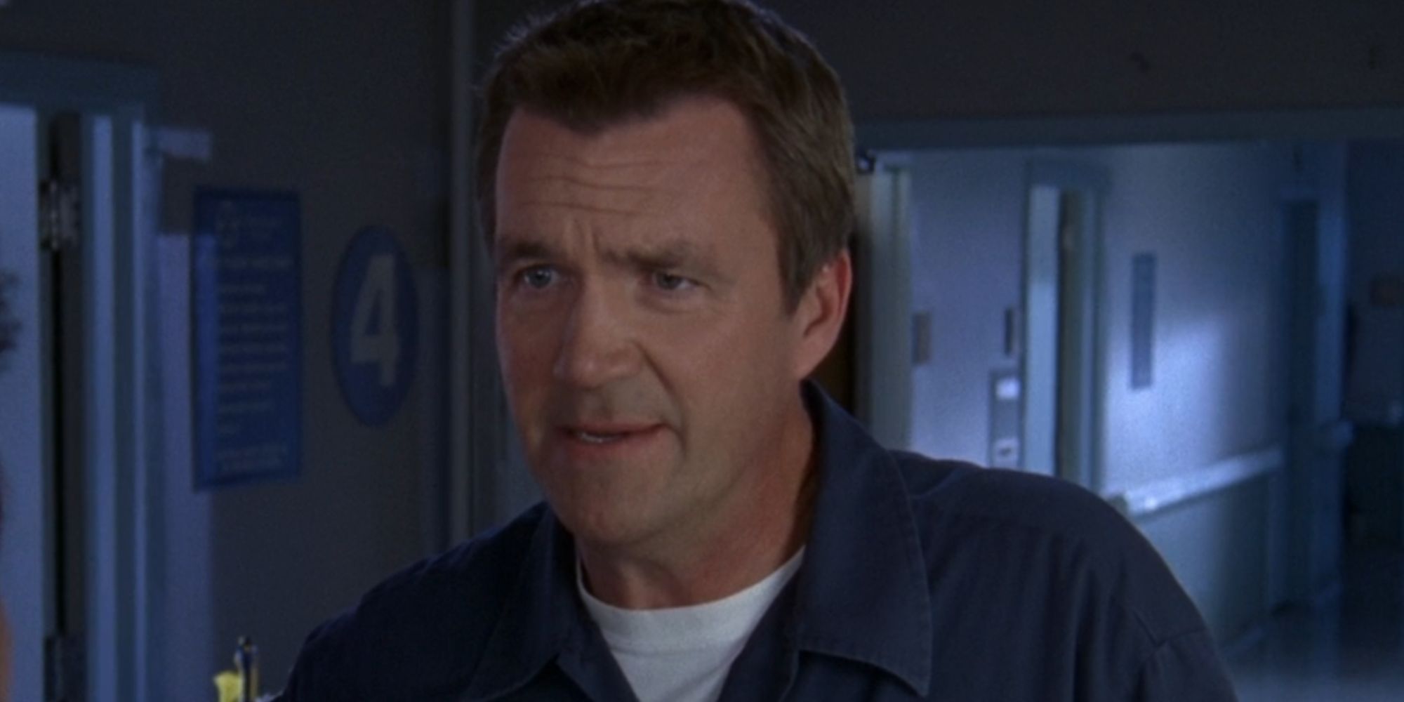 Neil Flynn looking serious as the Janitor in Scrubs