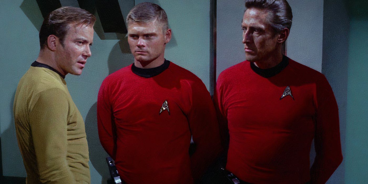 William Shatner as Captain Kirk with two redshirts in Star Trek: The Original Series.