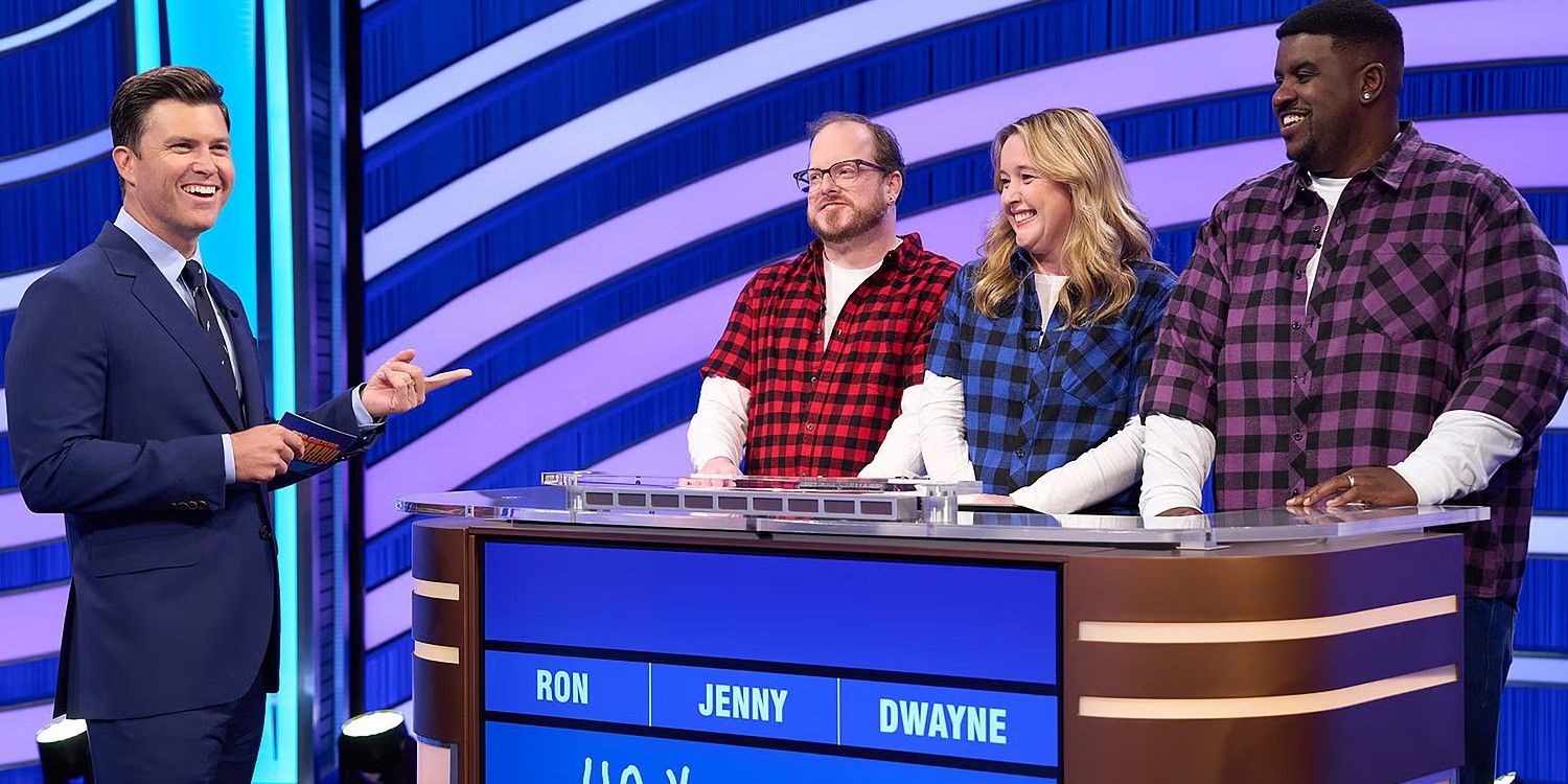 Colin Jost talking to contestants in Pop Culture Jeopardy!