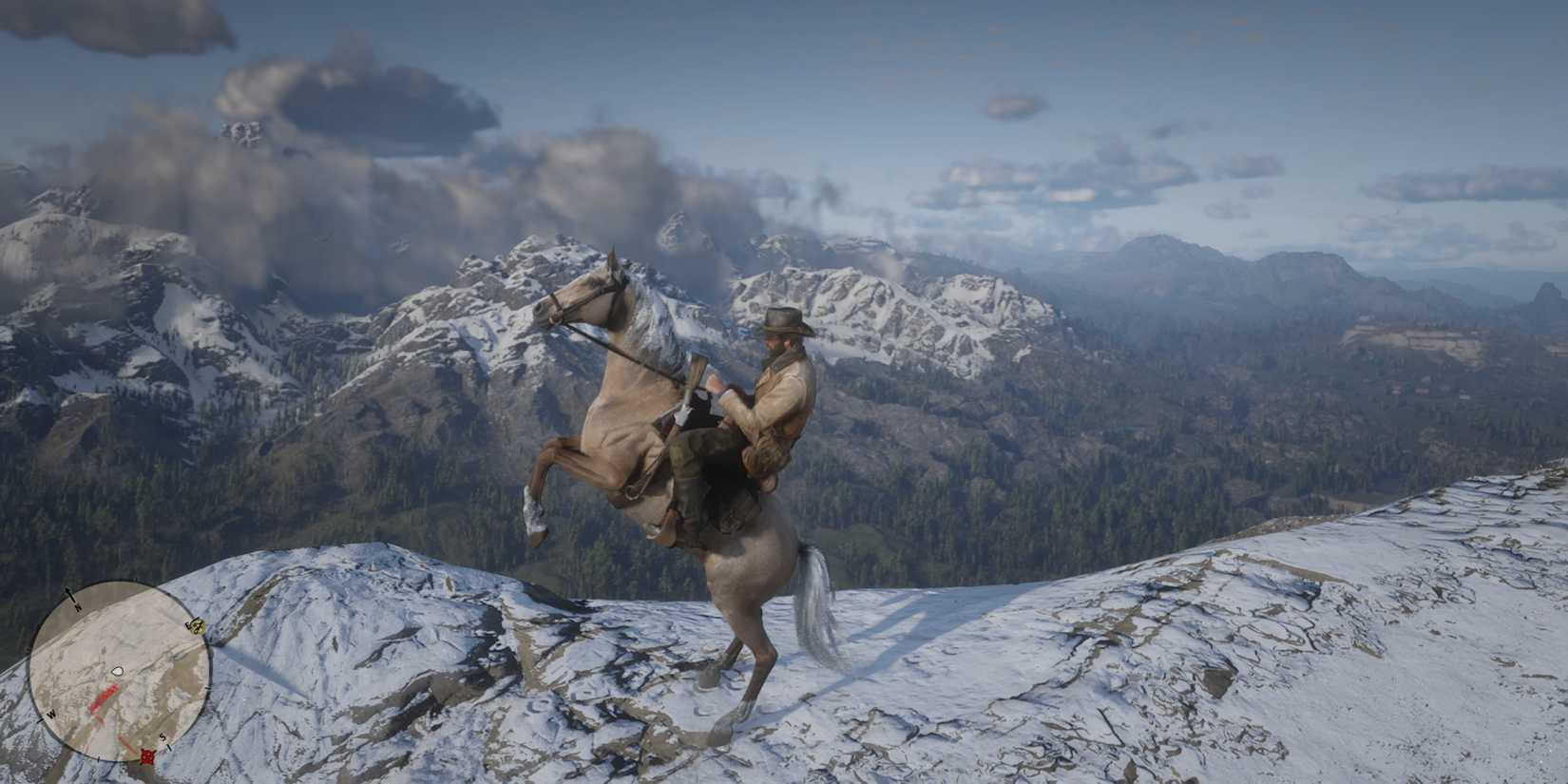 Arthur rearing his horse on Mount Shann in Red Dead Redemption 2.