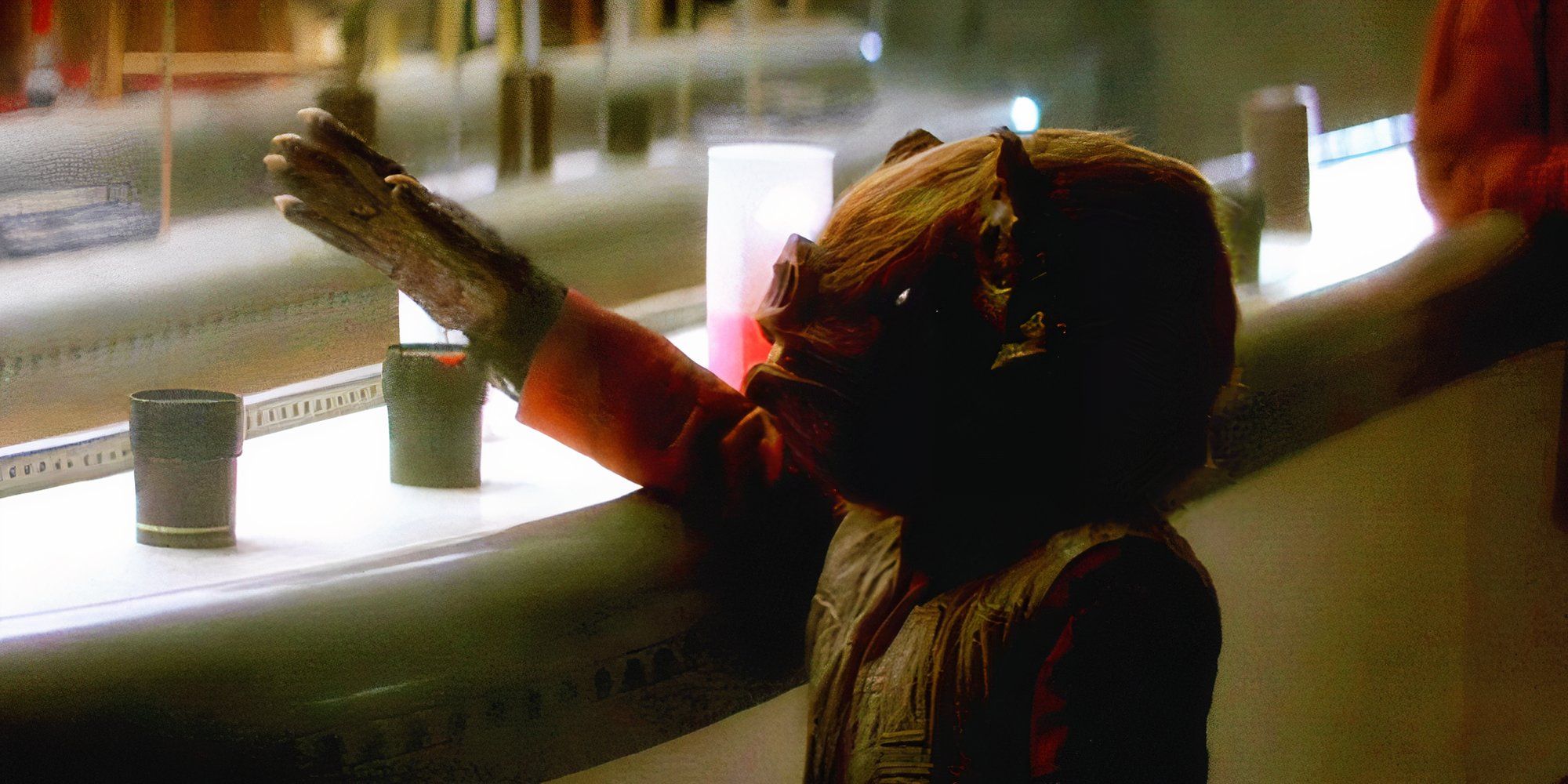 A Chadra-Fan inside the Mos Eisley cantina asks for another drink.