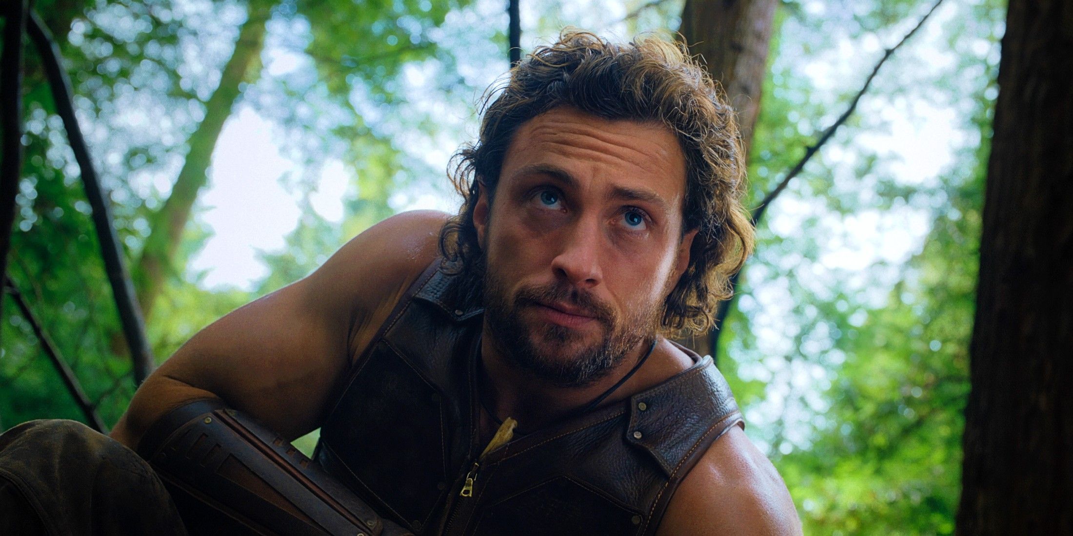 Aaron Taylor Johnson's Kraven the Hunter in the woods in Kraven the Hunter (2024)