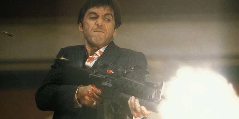 Al Pacino firing a gun as Tony Montana in Scarface