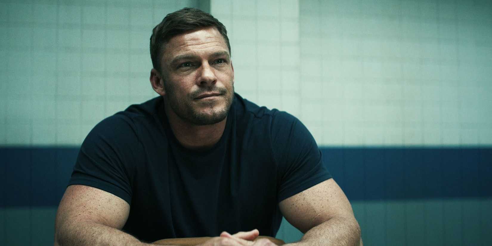 Alan Ritchson, in blue, as Jack Reacher in Reacher season 2, episode 3