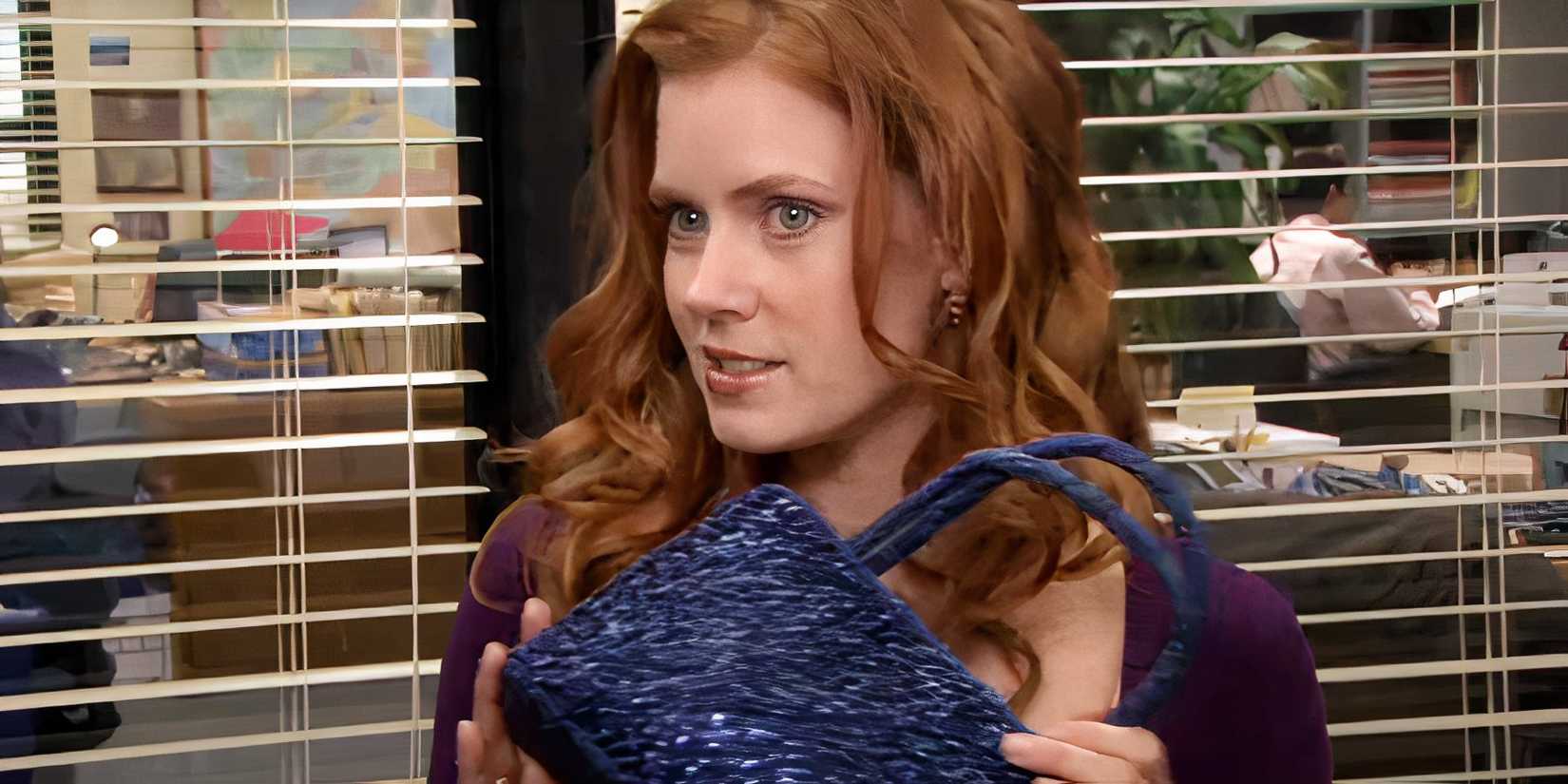 Amy Adams as Katy showing off a purse in The Office