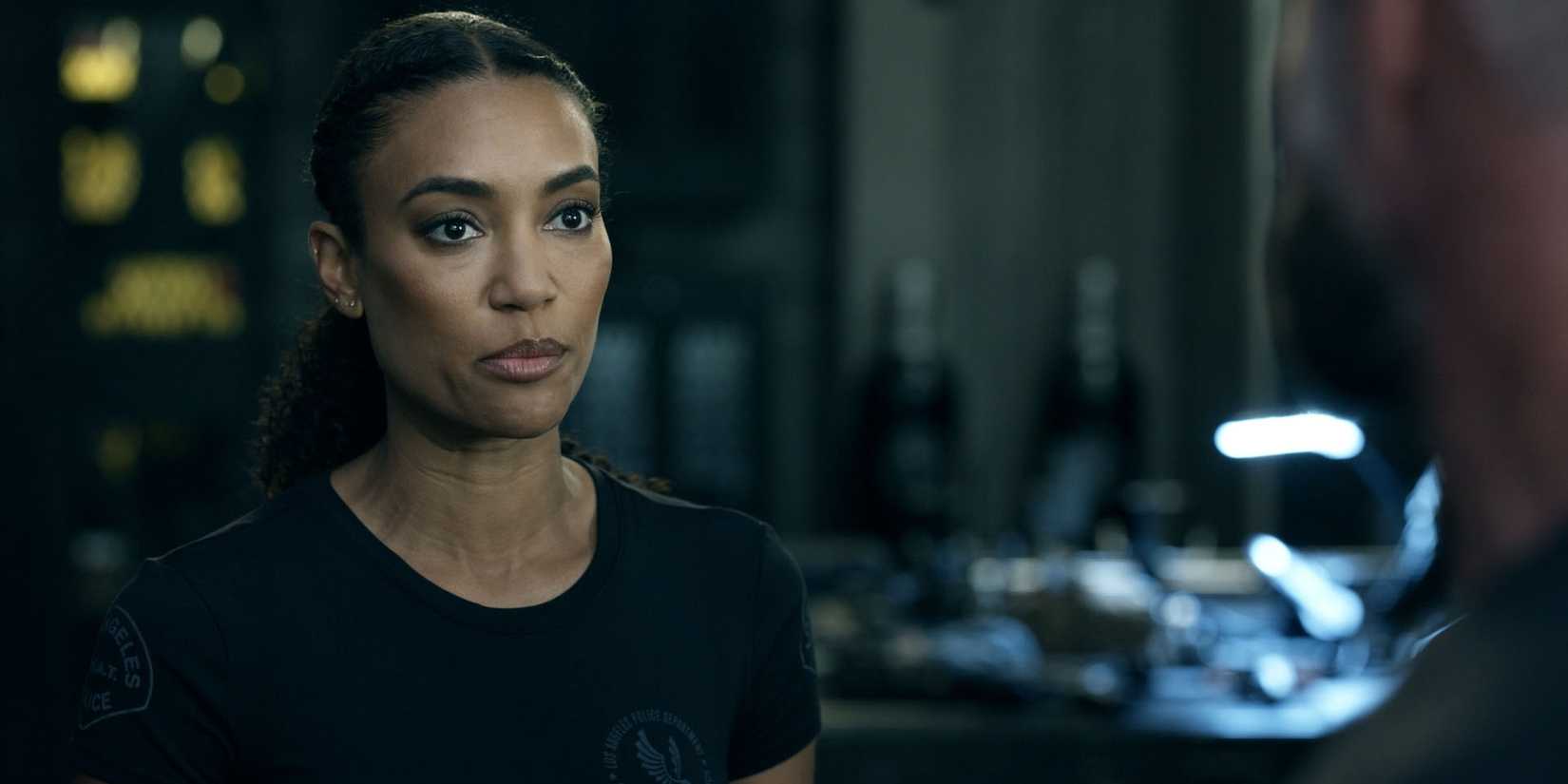 Annie Ilonzeh as Devin Gamble in SWAT wearing black top