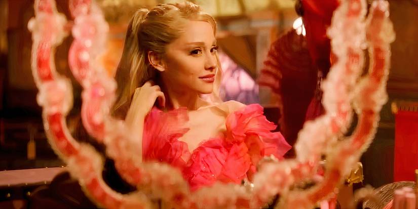 Ariana Grande as Galinda looking at herself in the mirror in Wicked