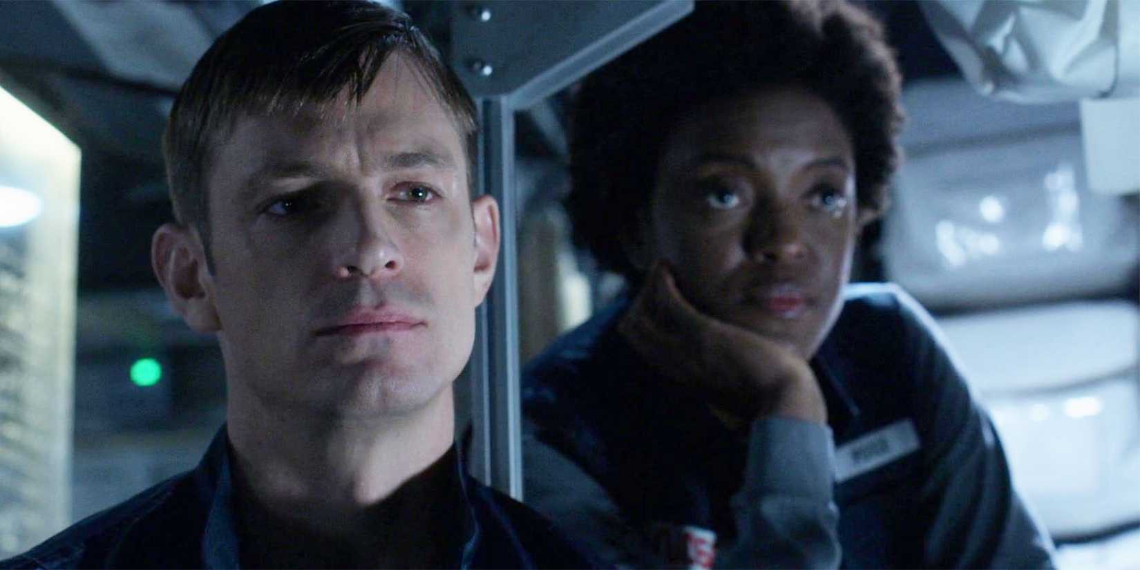 Baldwin and Poole in For All Mankind season 1, sitting side by side
