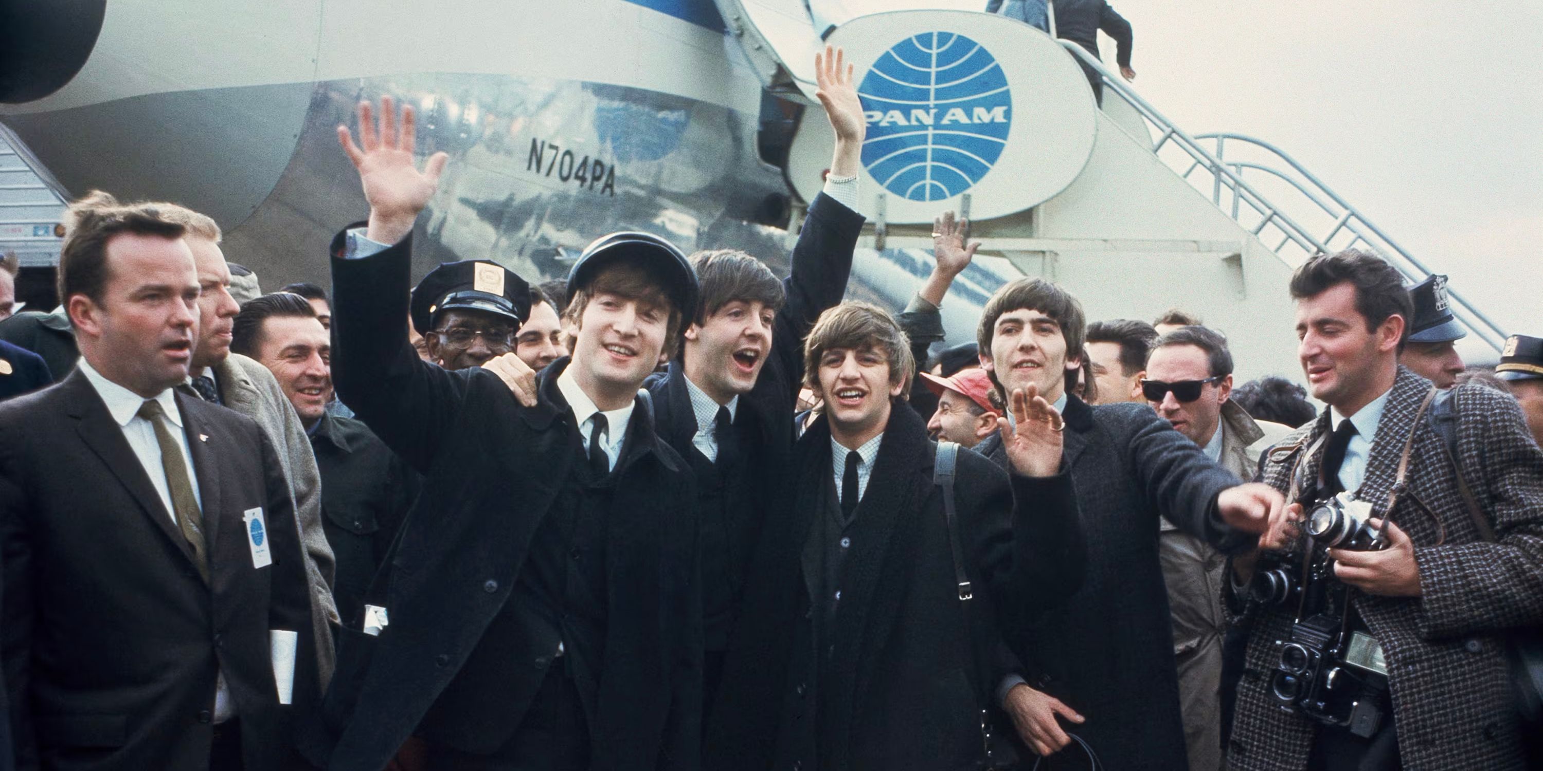 Beatles '64 the band waving to the fans