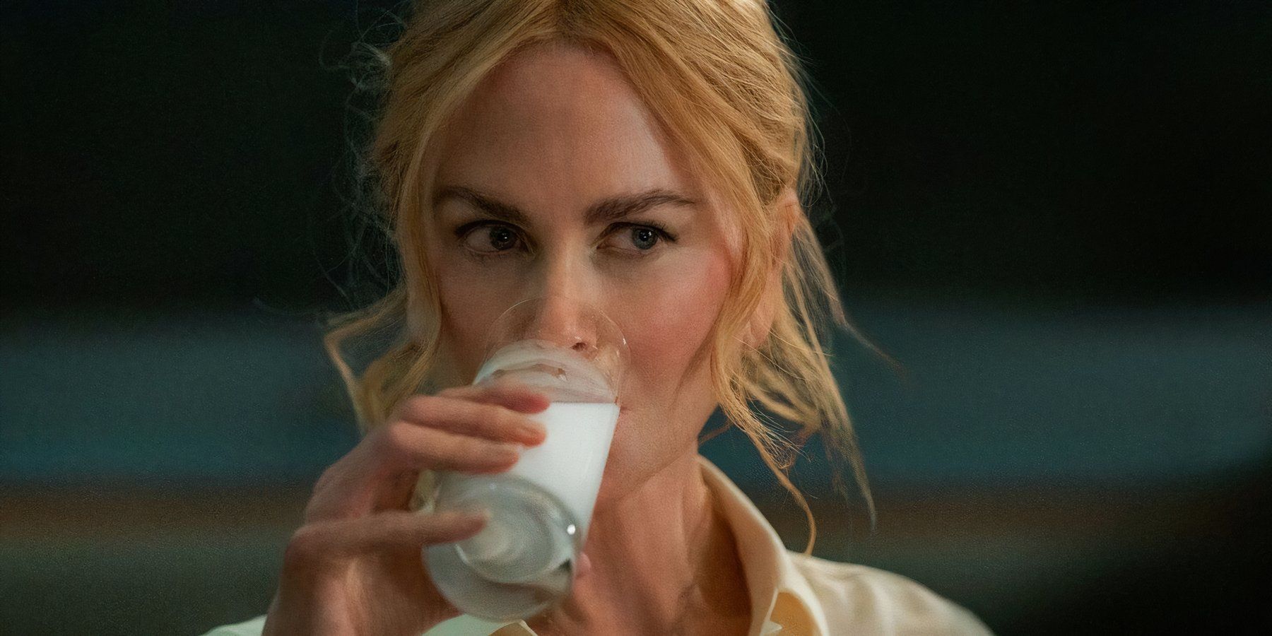 Nicole Kidman drinking a glass of milk in Babygirl