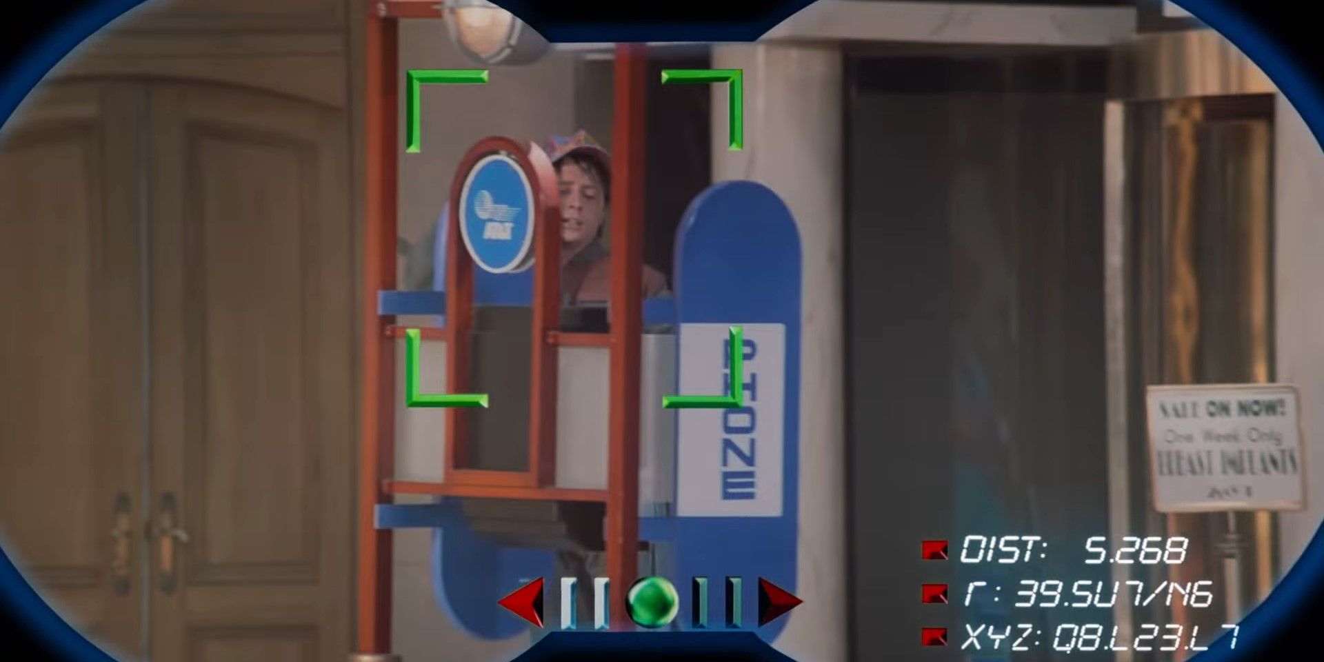 Marty McFly Jr. (Michael J. Fox) in a phone booth next to a sign that reads "Sale on now! One week only. Breast implants" in Back to the Future Part II