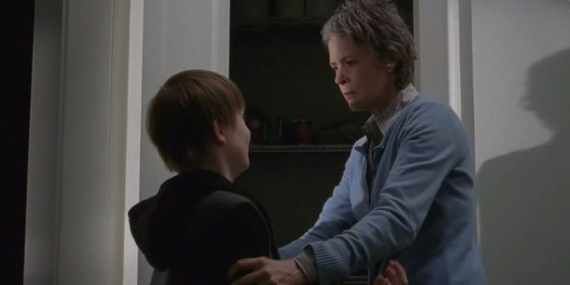 Carol threatens Sam in The Walking Dead