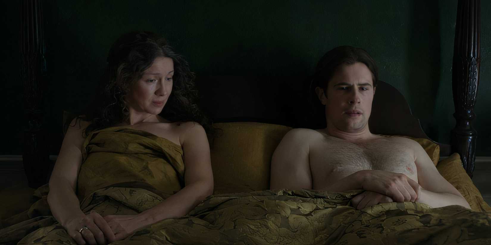 Claire and Lord John in bed together in Outlander