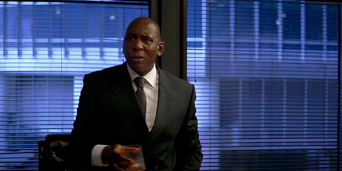 Commissioner Loeb in his office with a drink in The Dark Knight