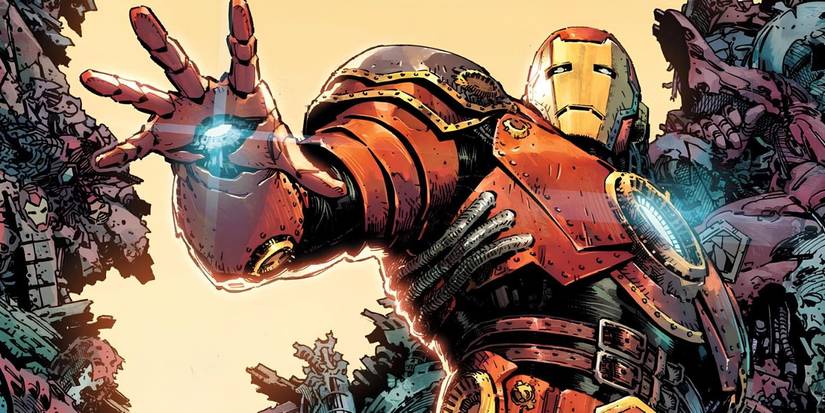 Iron Man amongst a pile of his Iron Man suits turned to rubble