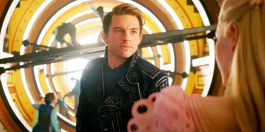 Jonathan Bailey standing before Glinda as Fiyero in Wicked's Dancing Through Life sequence