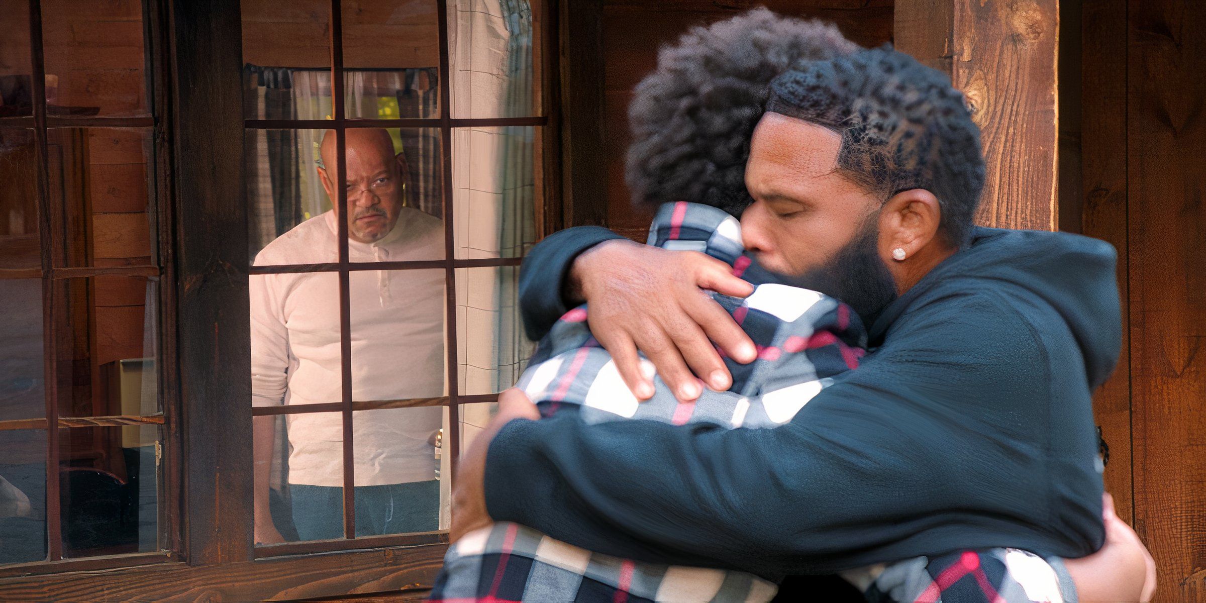 Dre and Junior hug while Pops watches Black-ish