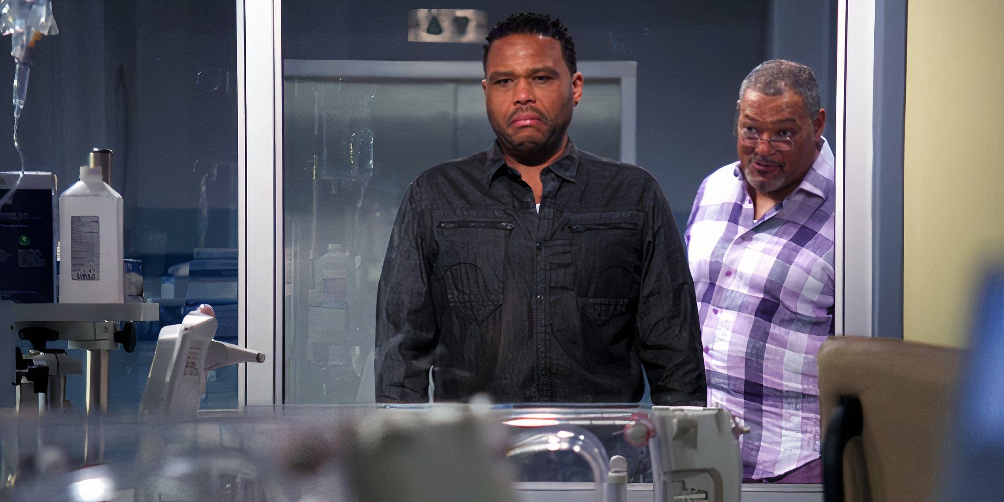 Dre and Pops stand in hospital