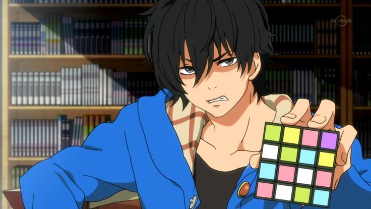 Haru Yoshida holding a Rubix cube with an angry facial expression