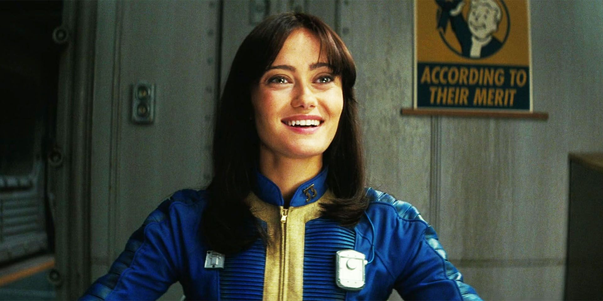 Ella Purnell as Lucy smiling at something off-screen in Fallout season 1, episode 1.