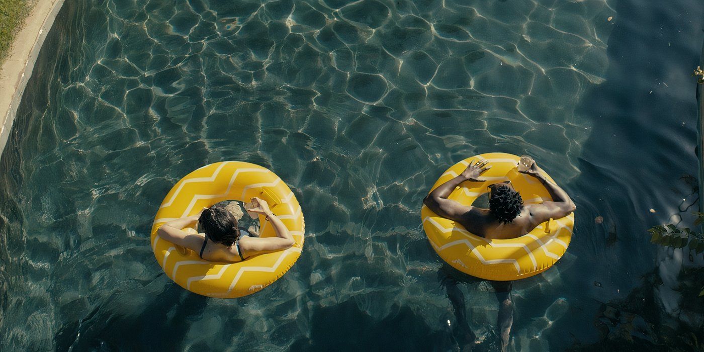 Emma and Noah in a pool in the Resort