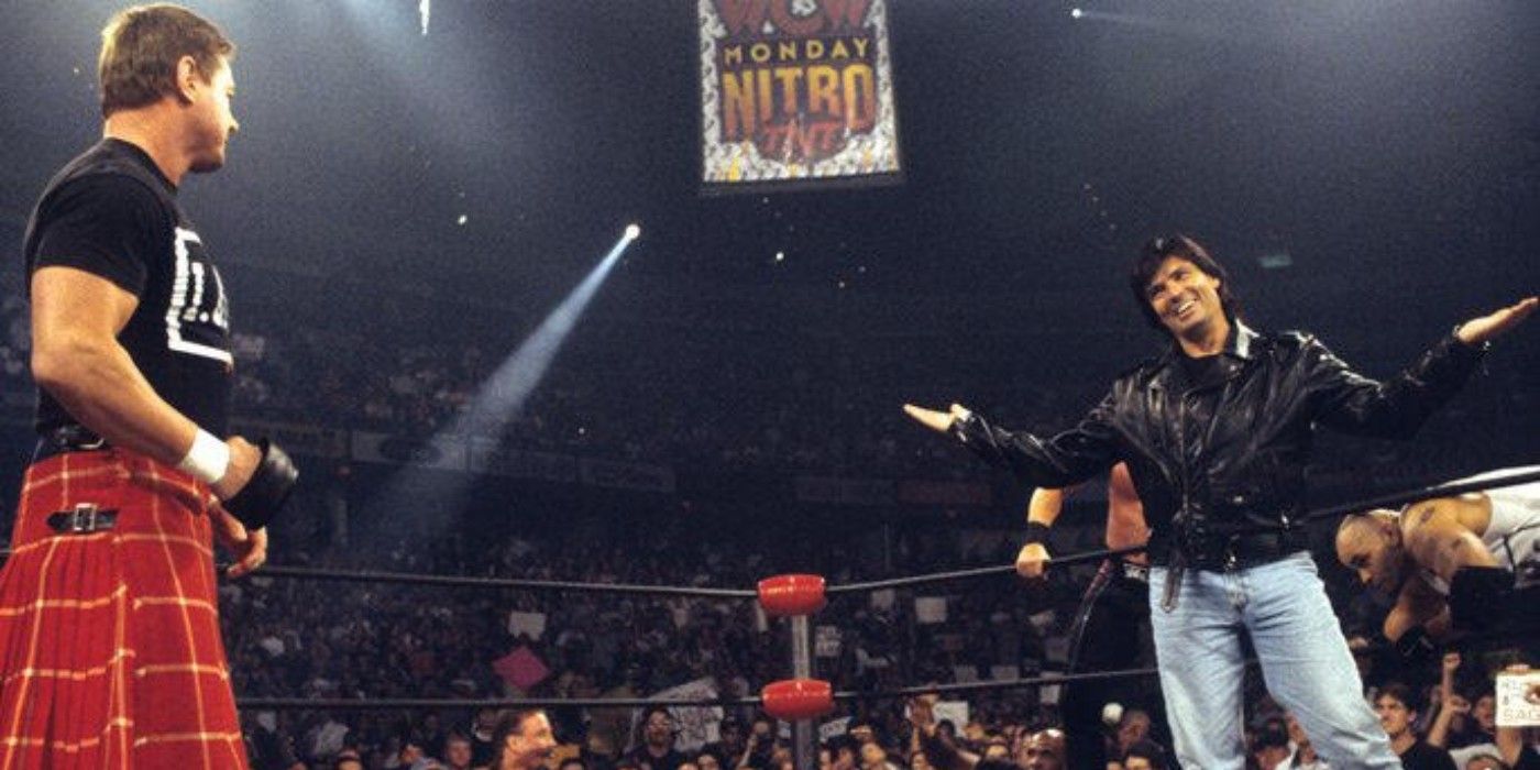 Eric Bischoff and the nWo staredown Rowdy Roddy Piper on WCW Monday Nitro
