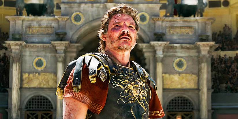Pedro Pascal as Acacius standing in the arena looking up in Gladiator 2.