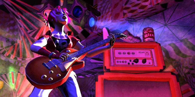 Guitarist standing by amp with neon lights flashing, Guitar Hero 2