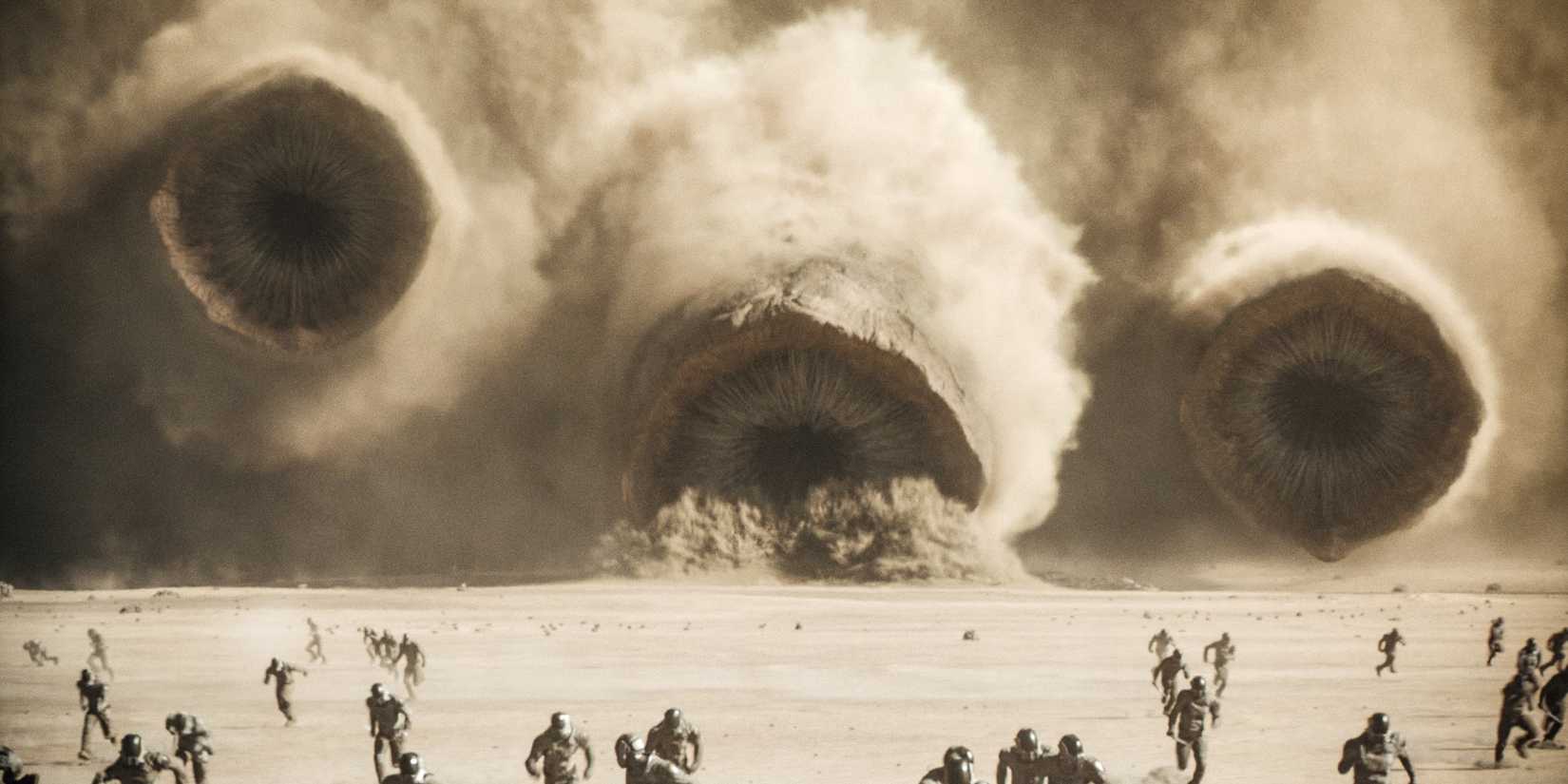 Harkonnen soldiers running from sandworms in Dune Part Two