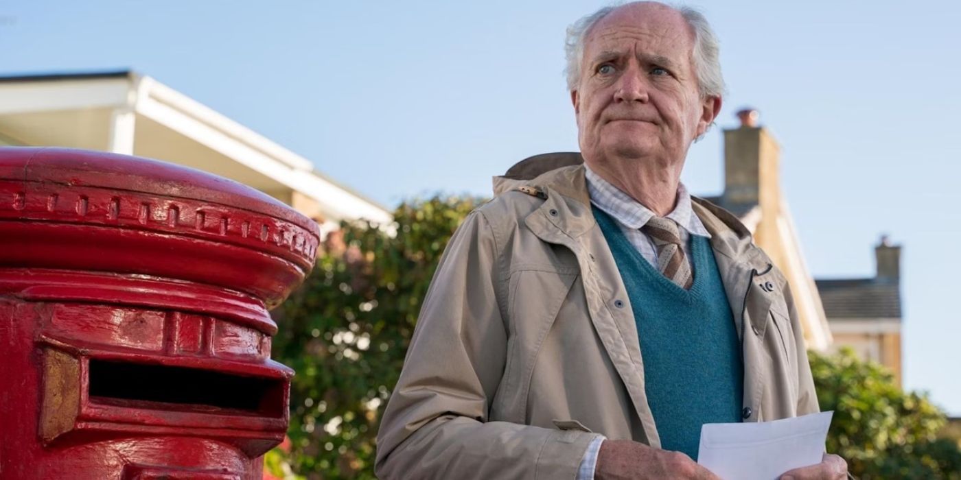 Harold Fry (Jim Broadbent) looking unhappy and holding a letter in Harold Fry's Unlikely Pilgrimage.