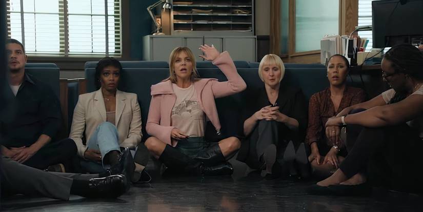 Morgan huddles up with a group while raising her hand in High Potential