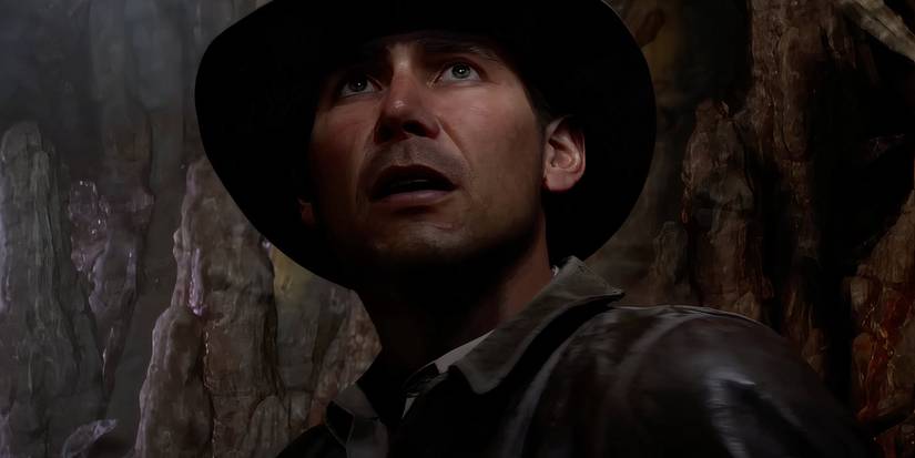 Indiana Jones from Indiana Jones and the Great circle looking up in awe.