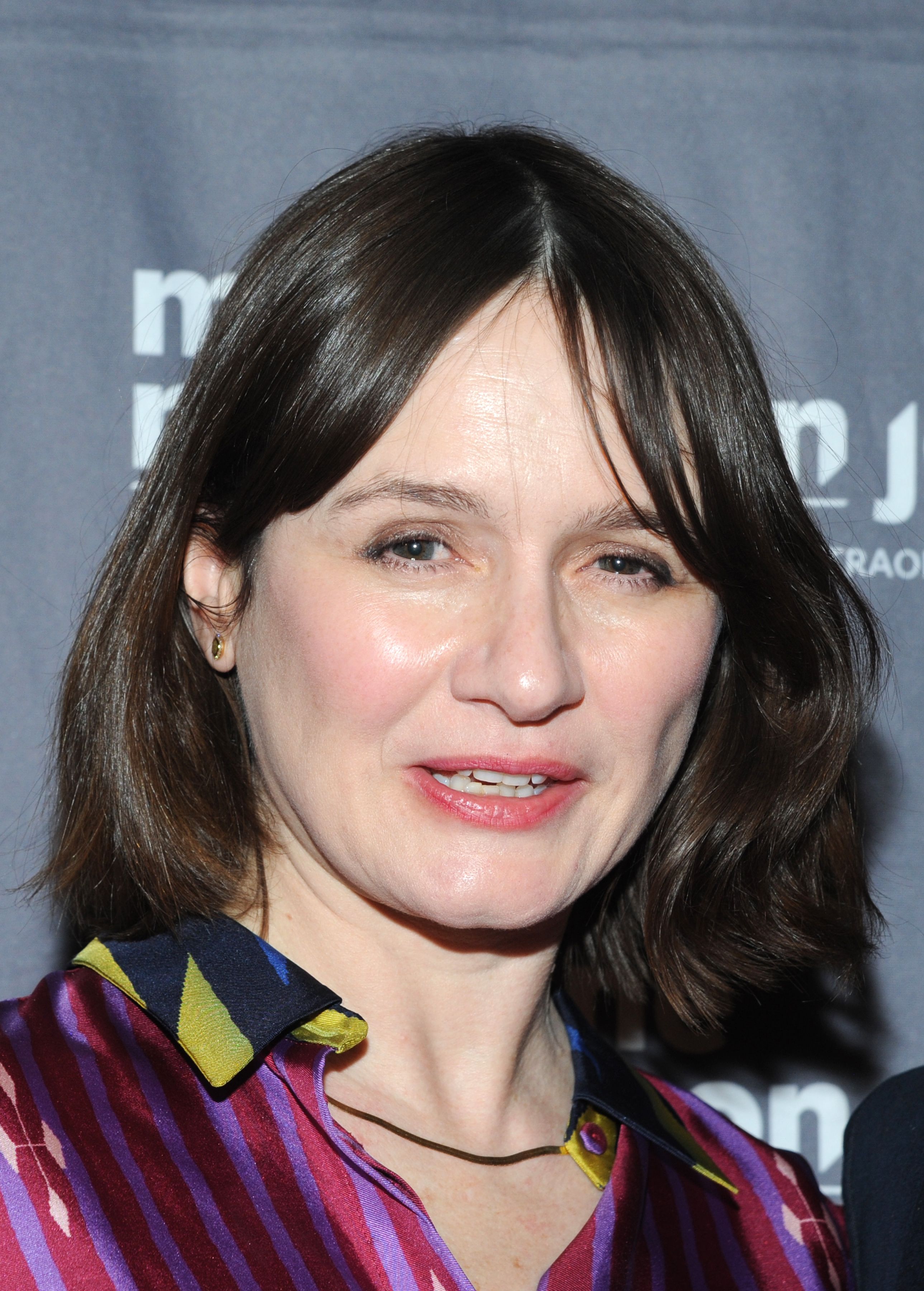 Shot in the head of Emily Mortimer